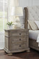 Ardenfield  Upholstered Sleigh Bed With Mirrored Dresser And Nightstand