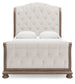 Ardenfield  Upholstered Sleigh Bed With Mirrored Dresser And Nightstand