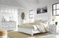 Kanwyn  Panel Bed With Mirrored Dresser, Chest And Nightstand