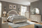 Realyn California  Upholstered Bed With Mirrored Dresser