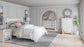 Altyra  Panel Bed With Mirrored Dresser