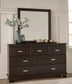 Covetown  Panel Bed, Dresser, Mirror, Chest And Nightstand