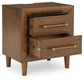 Lyncott California  Upholstered Bed, Dresser, Mirror, Chest And Nightstand