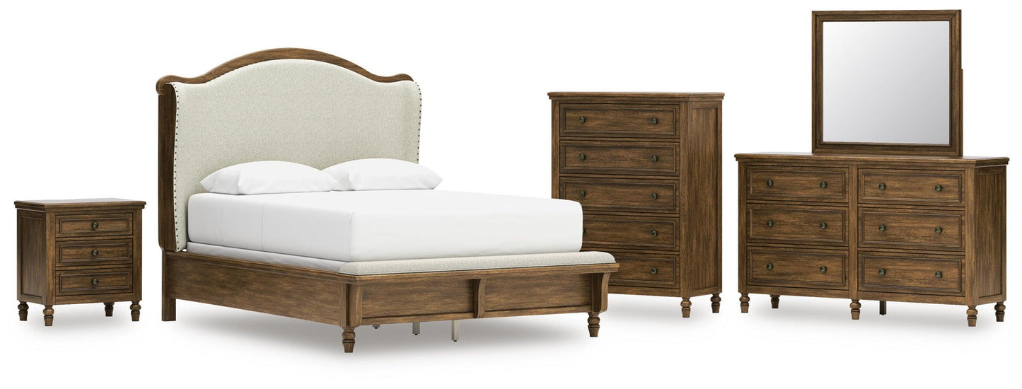 Sturlayne  Upholstered Panel Bed, Dresser, Mirror, Chest And Nightstand