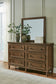 Sturlayne  Upholstered Panel Bed, Dresser, Mirror And Nightstand