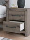 Graystorm  Panel Bed, Dresser, Mirror And Nightstand