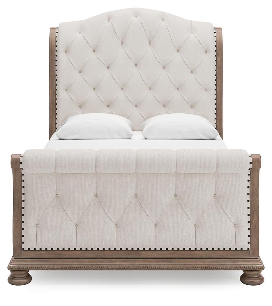 Ardenfield  Upholstered Sleigh Bed, Dresser, Mirror And Nightstand