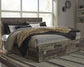 Derekson  Panel Bed With 6 Storage Drawers With Mirrored Dresser